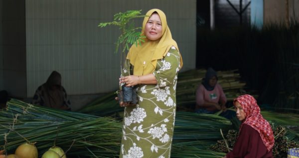 Woman planting trees